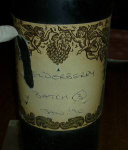 Bottle of homemade elderberry wine
