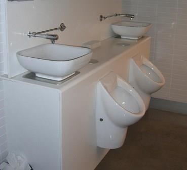 Sink water being used to flush urinals